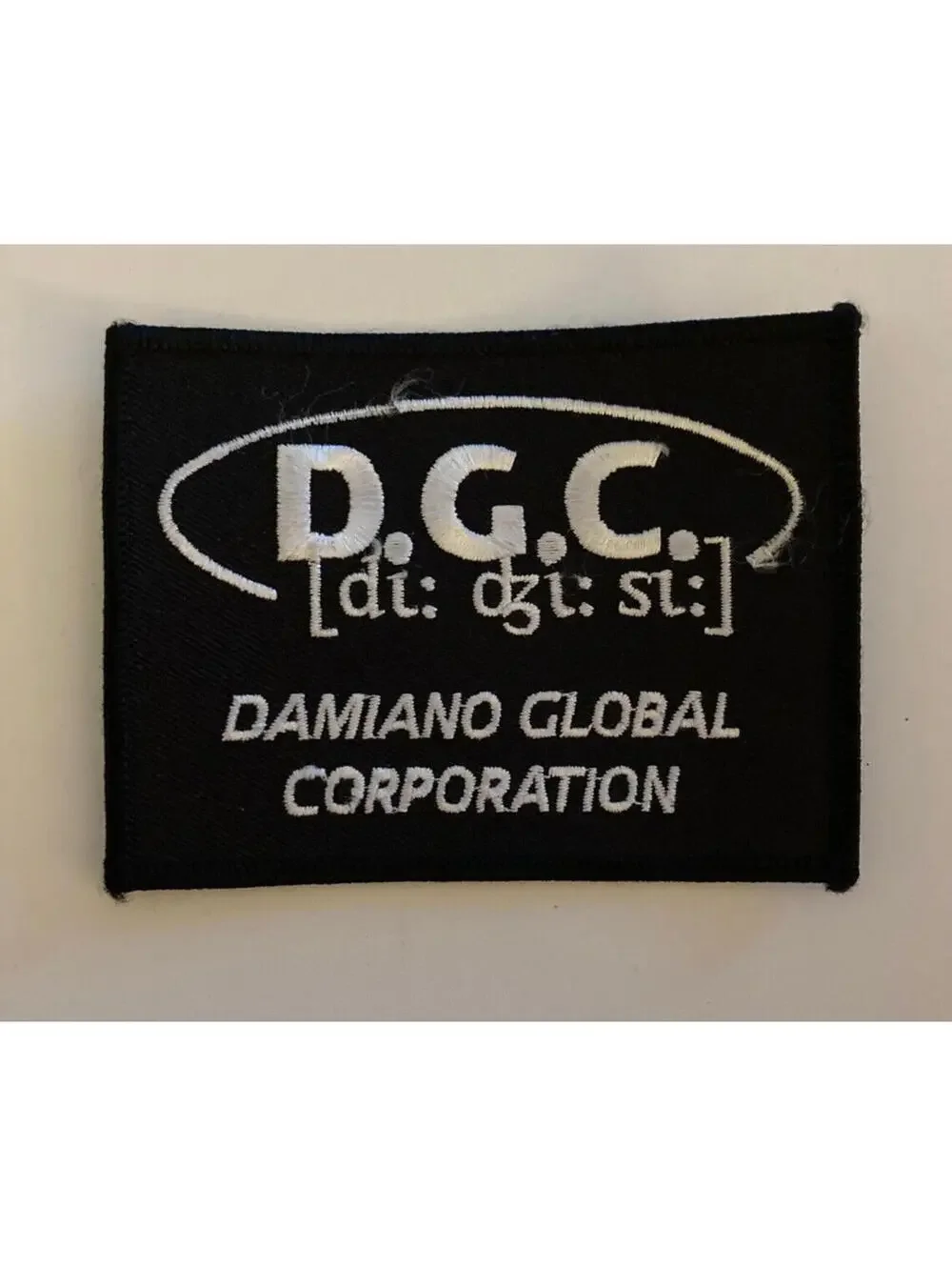 D.G.C. Damiano Global Corporation Patch Souvenir Embroidered Badge